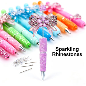 Close-up of a fluorescent pink rhinestone pen with sparkling crystal decorations and shiny barrel