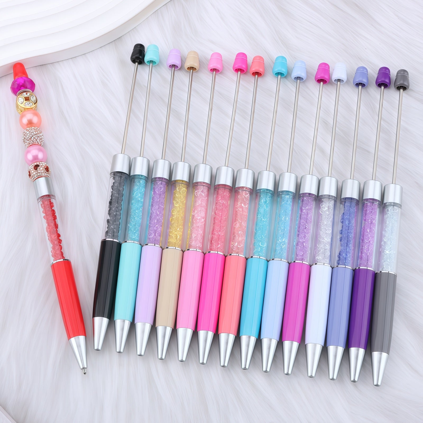 assorted rhinestone empty barrel pens in multiple colors for DIY crafts and journaling