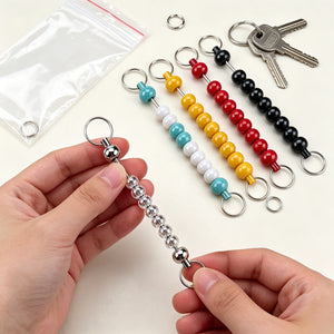 metal beading rod with beads as finished DIY keychain on keys