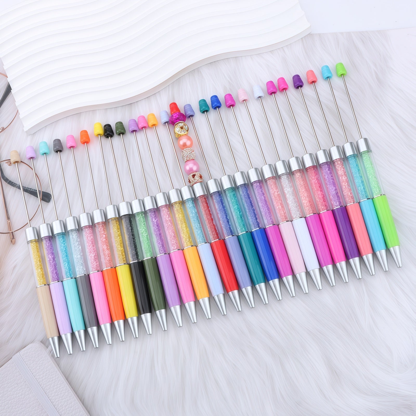 smooth 1.0mm black ink writing demonstration with rhinestone empty barrel pen on notebook paper