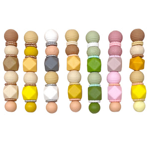 flat round silicone beads used as spacers on handmade bracelet
