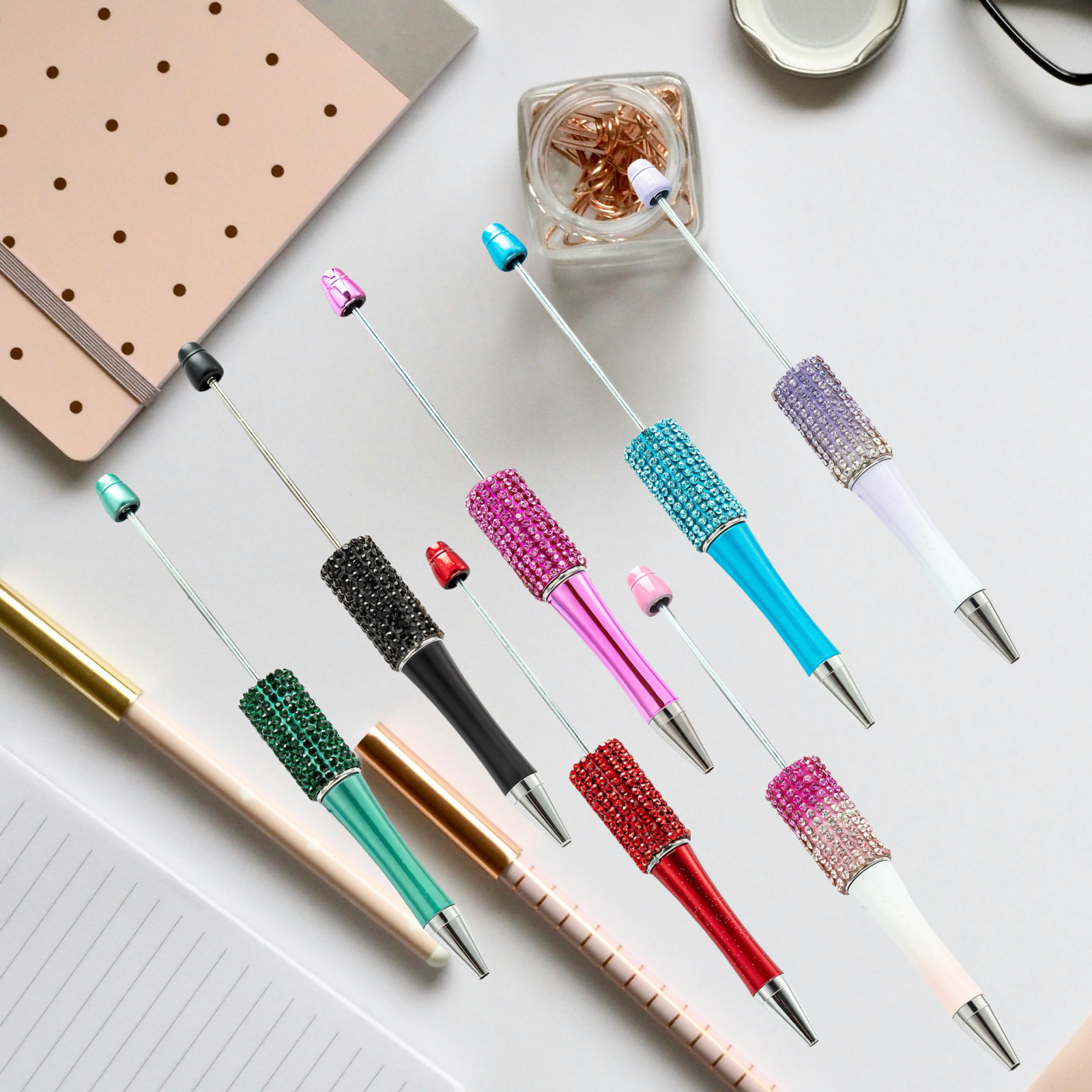 smooth 1.0mm black ink writing demonstration with rhinestone beadable pen on notebook paper
