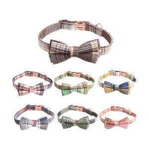 Small dog wearing cotton plaid bow tie collar looking stylish and comfortable