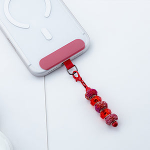 Slim flat lanyard clip designed to fit between phone and phone case without adhesive or sticky residue